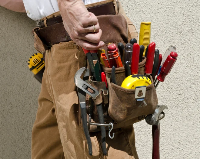 a person with a bag of tools